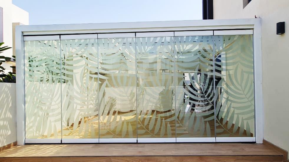 Transform Your Space with Frameless Folding Doors